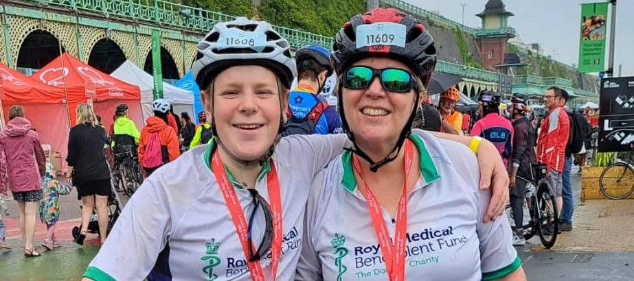 Owen Reece and his mother in cycling gear, having completed the race