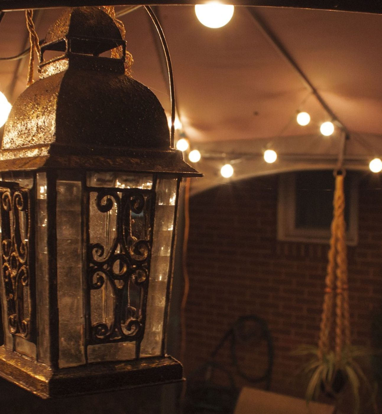 Gazebo with fairy lights and a lantern